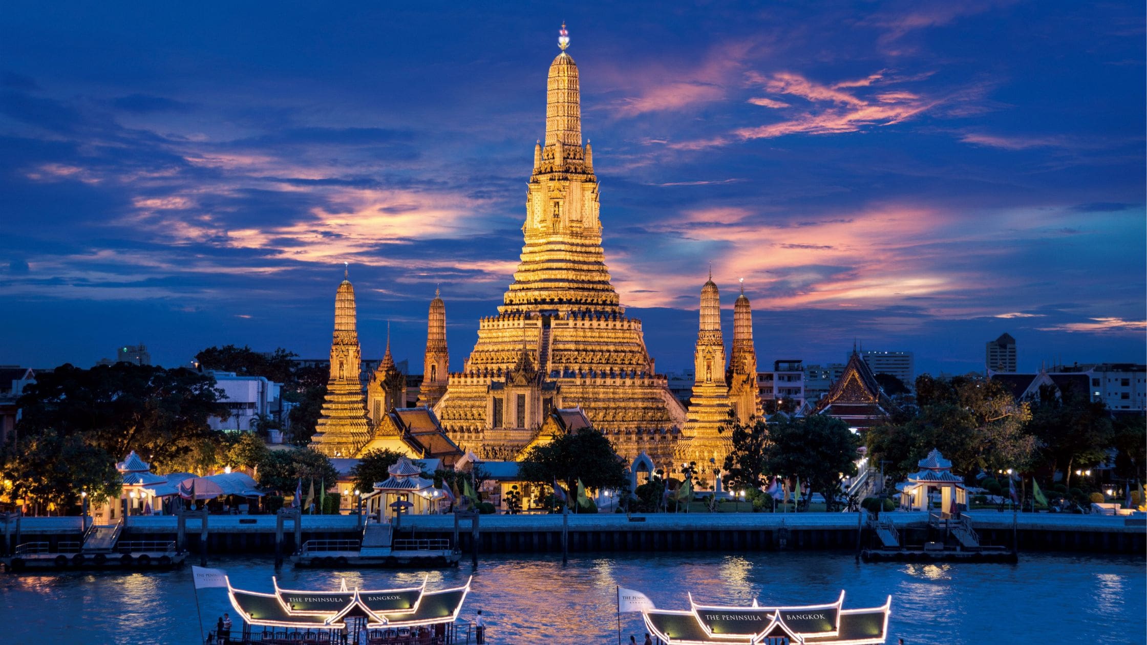 Cityscape of Bangkok, Thailand with modern buildings and temples.
